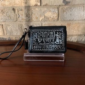 Coach Poppy leather wristlet with hangtag and animal print interior EUC